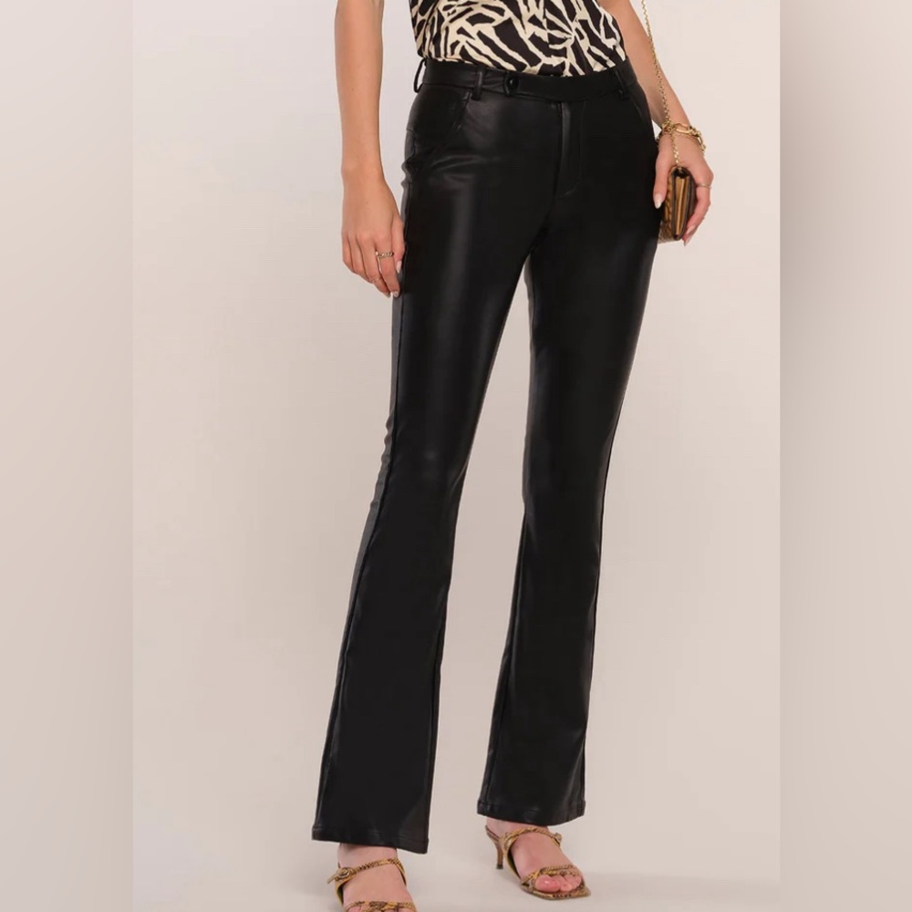 Really cute black flared leather/wax coated pants/jeans